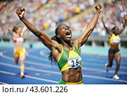 An African-American black athlete won during a sprint race or running at a sporting event. The concept of the Summer Olympic Games. Стоковое AI-изображение, AI-художник Photojuli / Фотобанк Лори
