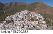 Aerial view of Ojen, white village over a hillside near Marbella, Spain in the spring. Стоковое видео, видеограф Яков Филимонов / Фотобанк Лори