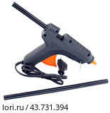 Клеевой пистолет на белом фоне. Electric hot glue gun isolated on white background. Стоковое фото, фотограф Татьяна Д / Фотобанк Лори