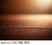 A close-up of bronze surface with a gradient, featuring curved lines and subtle light reflections. The texture of the bronze is smooth and metallic, creating a visually captivating abstract image. AI. Стоковое AI-изображение, AI-художник Юлия Петровская / Фотобанк Лори