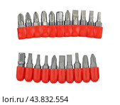 Набор сменных насадок, бит, для отверток на белом фоне. A variety of replaceable nozzles for screwdriver bits on a white background. Стоковое фото, фотограф Татьяна Д / Фотобанк Лори