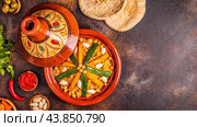 Vegetable tagine with almond and chickpea couscous. Стоковое фото, фотограф Татьяна  Бральнина / Фотобанк Лори