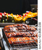 Pork ribs on the grill. Стоковое фото, фотограф Константин Григорьев / Фотобанк Лори