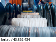 Production of copper wire, cable in reels at factory. Cable factory. Стоковое фото, фотограф Сергей Толмачёв / Фотобанк Лори