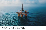 Offshore oil rig extracting petroleum in the middle of the ocean. Стоковое AI-видео, аниматор Юрий Поздников / Фотобанк Лори