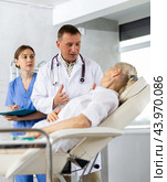 Sick female patient having aches and visiting doctor. Стоковое фото, фотограф Яков Филимонов / Фотобанк Лори