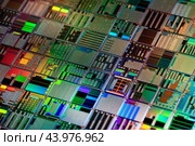 Silicon semiconductor wafer close-up. In electronics, a wafer also called a slice or substrate is a thin slice of semiconductor, a crystalline silicon, used for the fabrication of integrated circuits. Стоковое фото, фотограф Андрей Армягов / Фотобанк Лори
