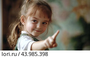 Portrait of a Smiling Girl Pointing Forward. Стоковое AI-изображение, AI-художник Zakharova Natasha / Фотобанк Лори