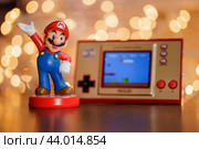 MOSCOW, RUSSIA - September 08, 2022: Super Mario Bros figure character.Super Mario is a Japanese platform video game series and media franchise created by Nintendo and featuring their mascot, Mario. Редакционное фото, фотограф Андрей Армягов / Фотобанк Лори
