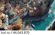 Aerial view of colorful coastal village with boats in a tranquil harbor in Italy during bright daylight. Стоковое AI-изображение, AI-художник Сергей Толмачёв / Фотобанк Лори