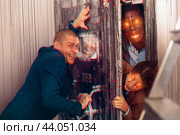 Young people having fun in quest room. Стоковое фото, фотограф Яков Филимонов / Фотобанк Лори