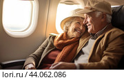 Joyful senior couple travelling by plane, holiday vacation concept. Стоковое AI-изображение, AI-художник Анастасия Золотницкая / Фотобанк Лори