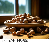 Dish with nuts. August 29 - Nut Savior. Nut Savior has several names. One of them is the Savior Not Made by Hands. Biblical tradition says that after sleeping, Jesus Christ washed his face and wiped it with a towel. Стоковое AI-изображение, AI-художник Сергей Елизарьев / Фотобанк Лори