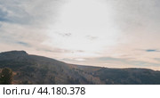 Mountain lake time lapse in summer or autumn. Wild nature and beautiful sunset. Moving clouds, deep twilight and dramatic sky. Стоковое видео, видеограф Александр Маркин / Фотобанк Лори