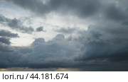 Dramatic cloudy sky with dark and light clouds, time lapse. Landscape for background and wallpaper. Стоковое видео, видеограф Андрей Журавлев / Фотобанк Лори