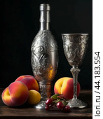 Antique wine bottle, silver wine glass and peaches. Still life. Стоковое AI-изображение, AI-художник Сергей Елизарьев / Фотобанк Лори