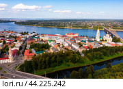 Aerial view of Rybinsk with Transfiguration Cathedral on bank of Volga and bridge. Стоковое фото, фотограф Яков Филимонов / Фотобанк Лори