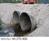 Culvert. Water drainage after rain. Стоковое фото, фотограф Сергей Бадалов / Фотобанк Лори