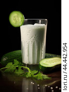 Glass of milk with fresh cucumber. Стоковое AI-изображение, AI-художник Veniamin Kraskov / Фотобанк Лори