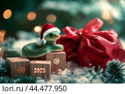 Змея в шапочке Санты, мешок подарков, детские кубики с цифрами 2025 у новогодней елки. Стоковое AI-изображение, AI-художник Щеголева Ольга / Фотобанк Лори