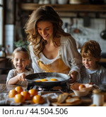 Mom teaches children to cook breakfast. Family breakfast. Fried eggs in a frying pan. Стоковое AI-изображение, AI-художник Коханова Наталья / Фотобанк Лори