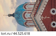 Close-up shot of the dome of the restored Orthodox church against a backdrop of the sunset sky. Стоковое видео, видеограф Strunov David / Фотобанк Лори