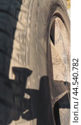 The right wheel of the crossover during the start of driving on an uneven country road. Close-up. Стоковое видео, видеограф Ярославский Максим / Фотобанк Лори