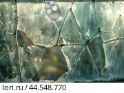 Shattered glass texture with sun flare. Стоковое AI-изображение, AI-художник Иван Рябоконь / Фотобанк Лори