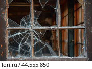 Shattered windowpane in old wooden frame. Стоковое AI-изображение, AI-художник Иван Рябоконь / Фотобанк Лори