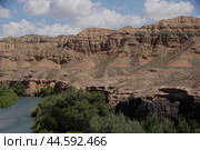 Canyon cliffs and a mountain river under a blue sky. Стоковое фото, фотограф Ярославский Максим / Фотобанк Лори