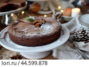Homemade chocolate cake on festive table. Стоковое AI-изображение, AI-художник Иван Рябоконь / Фотобанк Лори