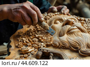 Master woodcarver at work on floral basrelief. Стоковое AI-изображение, AI-художник Иван Рябоконь / Фотобанк Лори