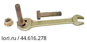Гаечный ключ и металлический болт с гайкой на белом фоне. Spanner with nut and bolt on white background. Стоковое фото, фотограф Татьяна Д / Фотобанк Лори
