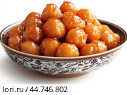 Delicious Tatar chak-chak served on a plate isolated on a white background. Стоковое AI-изображение, AI-художник Veniamin Kraskov / Фотобанк Лори
