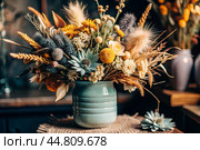 A beautiful bouquet of dried flowers in a ceramic vase on an antique wooden chest of drawers. A bouquet of flowers in a vase in a home interior. Light, beige, blue floral background. Стоковое AI-изображение, AI-художник Photojuli / Фотобанк Лори