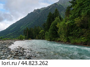 View of the Psysh riverbed in the northern foothills of the Caucasus Mountains near the village of Arkhyz on a sunny summer day, Karachay-Cherkessia, Russia. Стоковое фото, фотограф Ula Ulachka / Фотобанк Лори