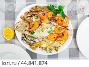 Assorted fried fish with shrimps - seito, sardine, witch, palaia, moll, redfish. Стоковое фото, фотограф Яков Филимонов / Фотобанк Лори