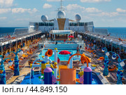 Cruise ship MSC Opera. Cruise Line MSC, cruise ship MSC Opera sails from port Sir Bani Yas (2023 год). Редакционное фото, фотограф Павел Муравьев / Фотобанк Лори