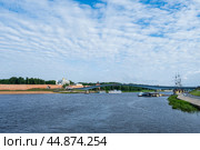 Veliky Novgorod, Novgorod Oblast, Russia - July 30, 2024. View of Novgorod Kremlin across the Volkhov River. Стоковое фото, фотограф Ольга Губская / Фотобанк Лори
