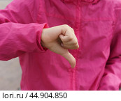 Sign language. Thumb down. Стоковое фото, фотограф YuryKara / Фотобанк Лори