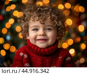 Little kid make a wish on Christmas Eve. Festive New Year atmosphere. Стоковое фото, фотограф Сергей Елизарьев / Фотобанк Лори