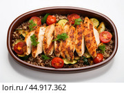 Buckwheat with chicken breast, baked with vegetables. Rich source of protein, fiber and vitamins to keep you energized and fit during your workouts. Стоковое AI-изображение, AI-художник Veniamin Kraskov / Фотобанк Лори