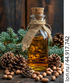 Cedar oil is used as a food product, in cosmetics and dietary supplements. Стоковое AI-изображение, AI-художник Сергей Елизарьев / Фотобанк Лори