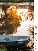 The Golden Ring of Russia, the city of Pereslavl-Zalessky. Fishing boats on the Trubezh River at dawn. Стоковое фото, фотограф Photojuli / Фотобанк Лори