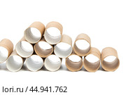 Empty toilet paper on white background. Стоковое фото, фотограф Сергей Толмачёв / Фотобанк Лори