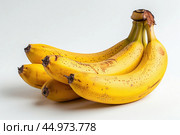 A bunch of ripe yellow bananas isolated on a white background. Стоковое AI-изображение, AI-художник Veniamin Kraskov / Фотобанк Лори