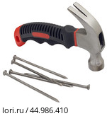 Молоток и гвозди на белом фоне. Hammer and nails on a white background. Стоковое фото, фотограф Татьяна Д / Фотобанк Лори