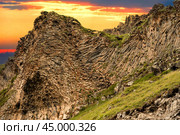 Unusual rock formation on sunset. Mountains landscape. Idyllic mountain background. Amazing scene with mountains. beautiful mountain landscape at sunrise. Стоковое фото, фотограф Павел Муравьев / Фотобанк Лори