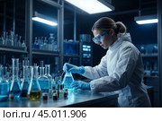 Scientist working putting experience mixing reagents in chemical laboratory wearing clean room protective suit conducting research while. Scientific and medical lab concept. Copy ad text space. Стоковое AI-изображение, AI-художник Aleksandr Golubev / Фотобанк Лори