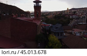 Evening Drone View of Tbilisi's Architectural Heritage. Стоковое видео, видеограф Поскребышев Михаил / Фотобанк Лори